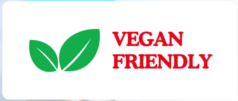 A graphic with two green leaves and the words 'Vegan Friendly' in red text.