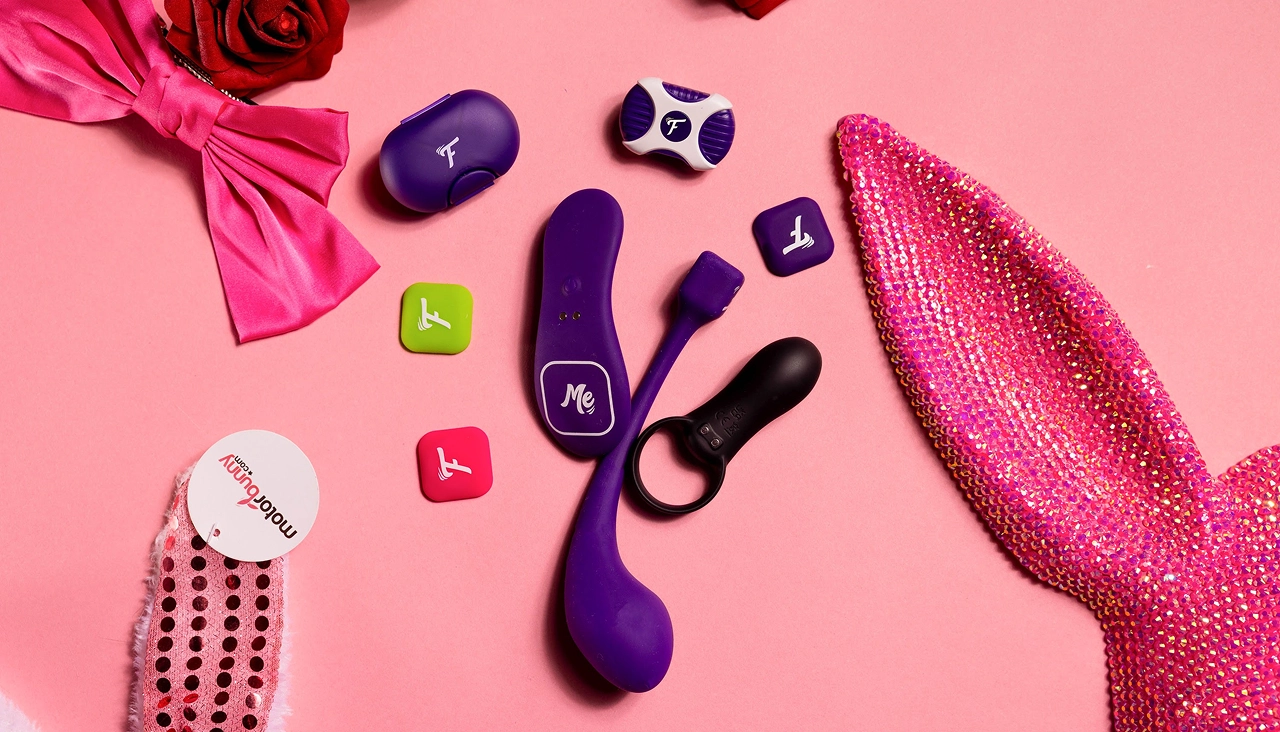 The Motorbunny Fluffer enabled toy collection on a pink background with pink bunny ear props.