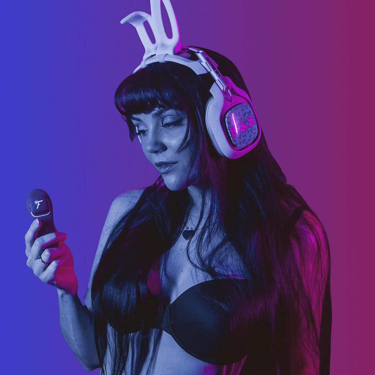 An e-girl with bunny headset on, holding a Fluffer panty vibe, with a purple gradient background 