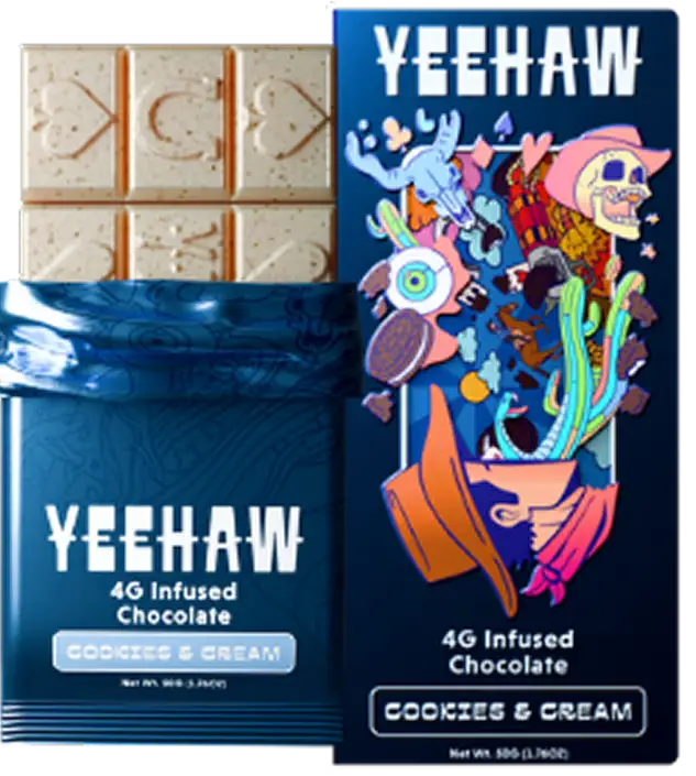 A Yeehaw brand Cookies & Cream infused chocolate bar next to its colorful, psychedelic western-themed packaging.