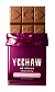 A milk chocolate bar partially unwrapped from a shiny magenta wrapper with the word 'YEEHAW' on it.