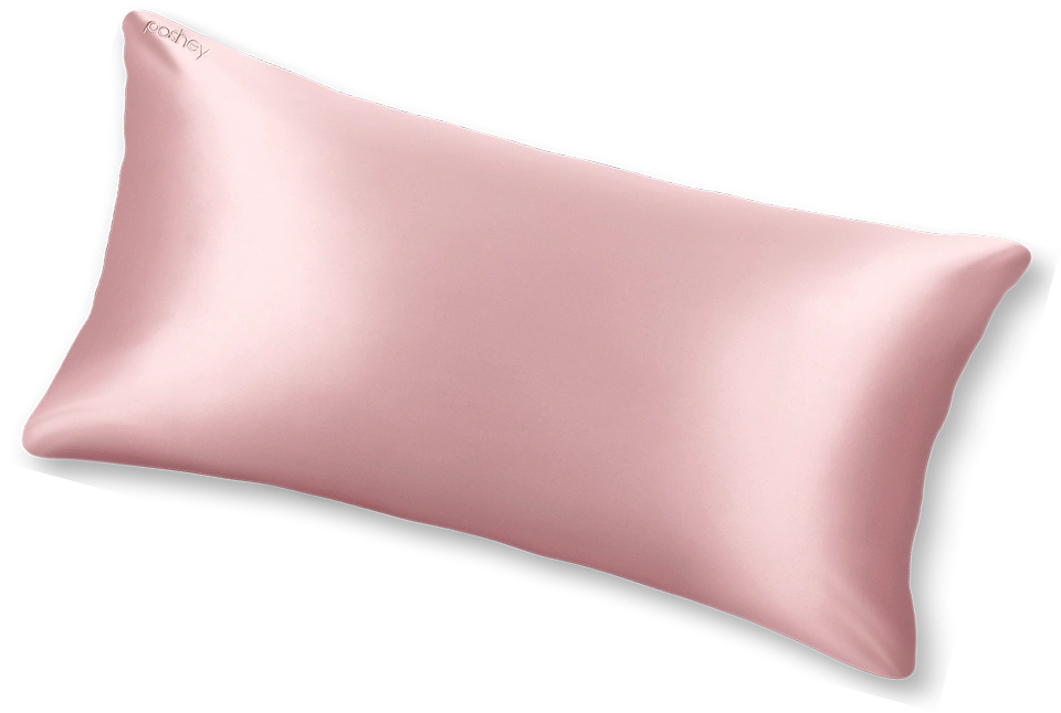 Pink satin pillow with a subtle sheen and brand logo in the corner.