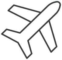 Silhouette of an airplane icon in black.
