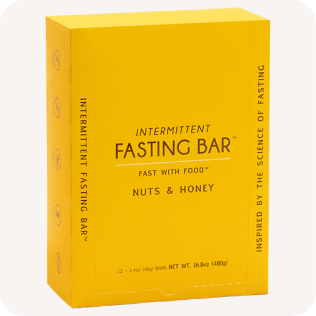 A yellow box of Intermittent Fasting Bar, Nuts & Honey flavor, against a light background.