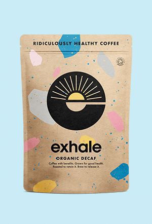 Brown coffee bag with colorful abstract design and 'exhale' branding.