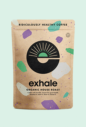 Brown coffee bag labeled 'exhale' with colorful abstract shapes.