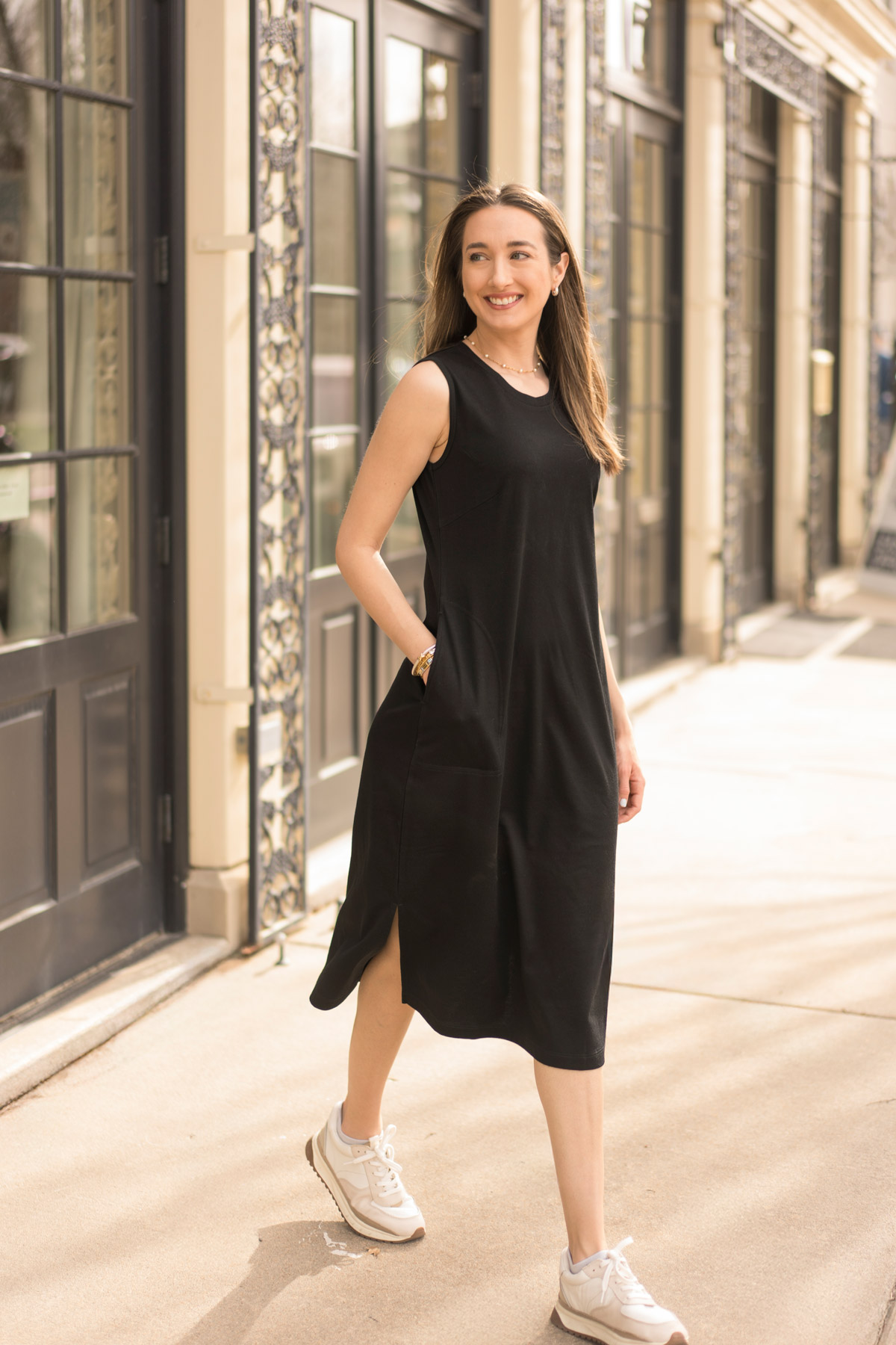 Woman in black dress with text about Merino wool benefits.