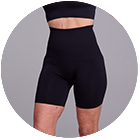 Person wearing high-waisted black compression shorts and top, cropped at the torso.