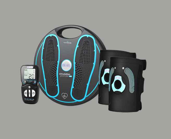 Foot massager with remote and leg wraps on a gray background.
