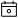 A grey and white line art icon of a calendar with a circle in the center.