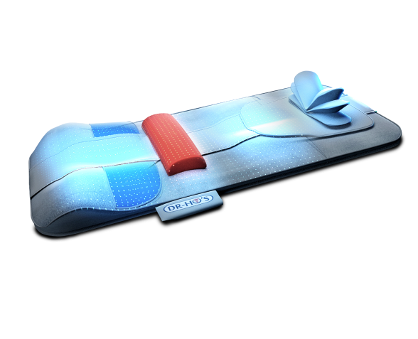 Massage pad with a red cushion and labeled tag, showing blue highlights and sculpted surface.