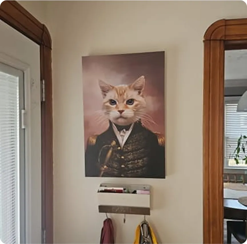 Painting of a cat dressed in historical military attire on a wall.