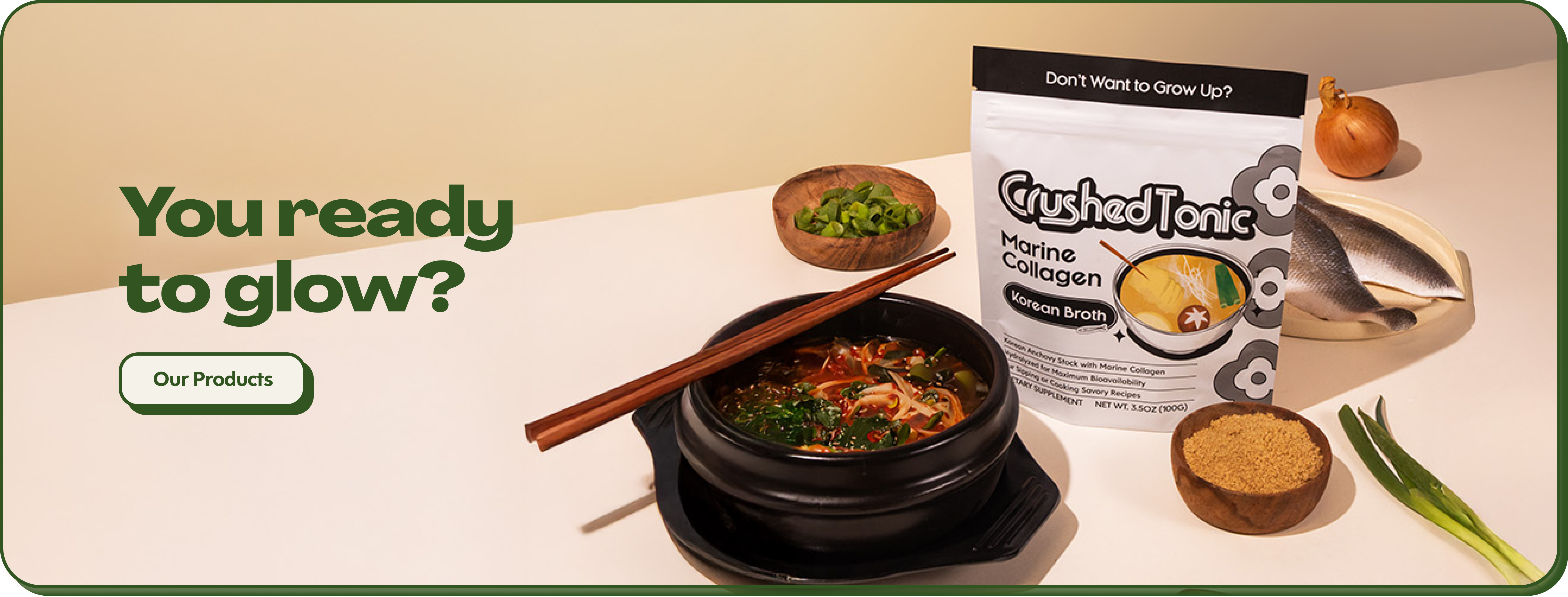 Bowl of soup with chopsticks, Crushed Tonic package, green onions, onion, fish, and spices displayed.