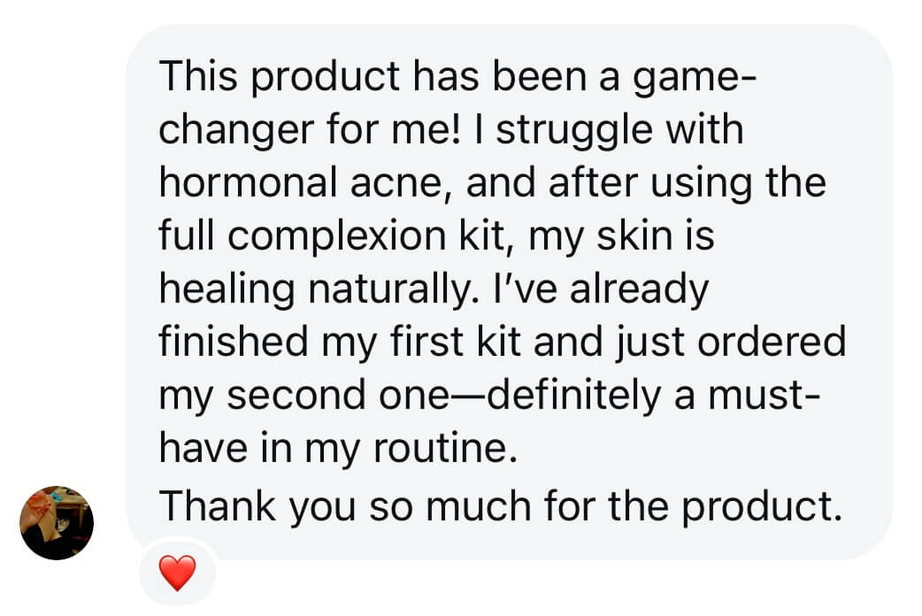 Text message praising a skincare product for improving acne.