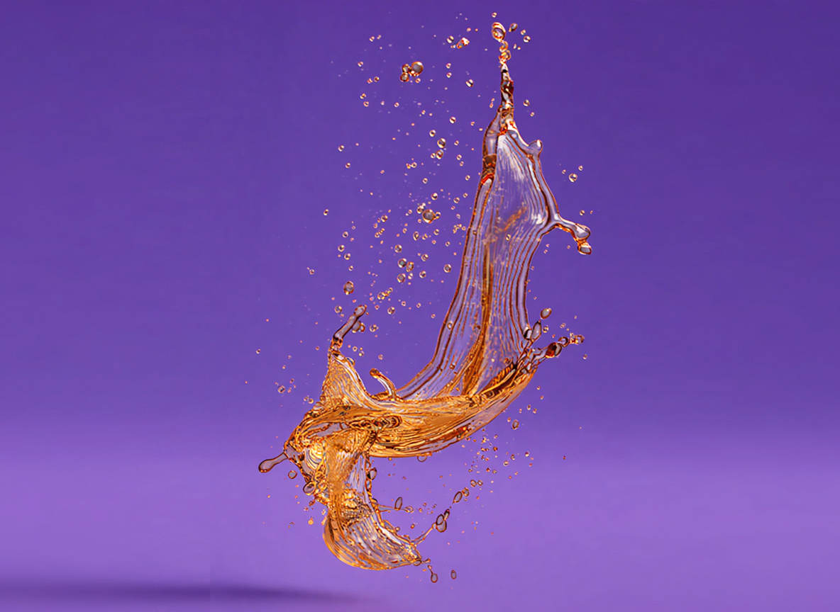 Orange liquid splash against a purple background.
