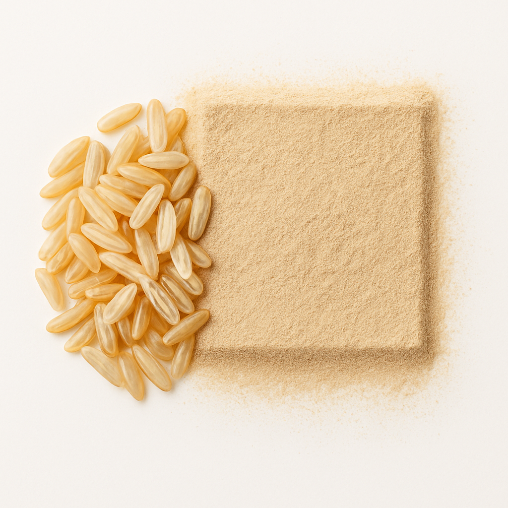 Pile of rice grains next to a square of rice flour on a white background.
