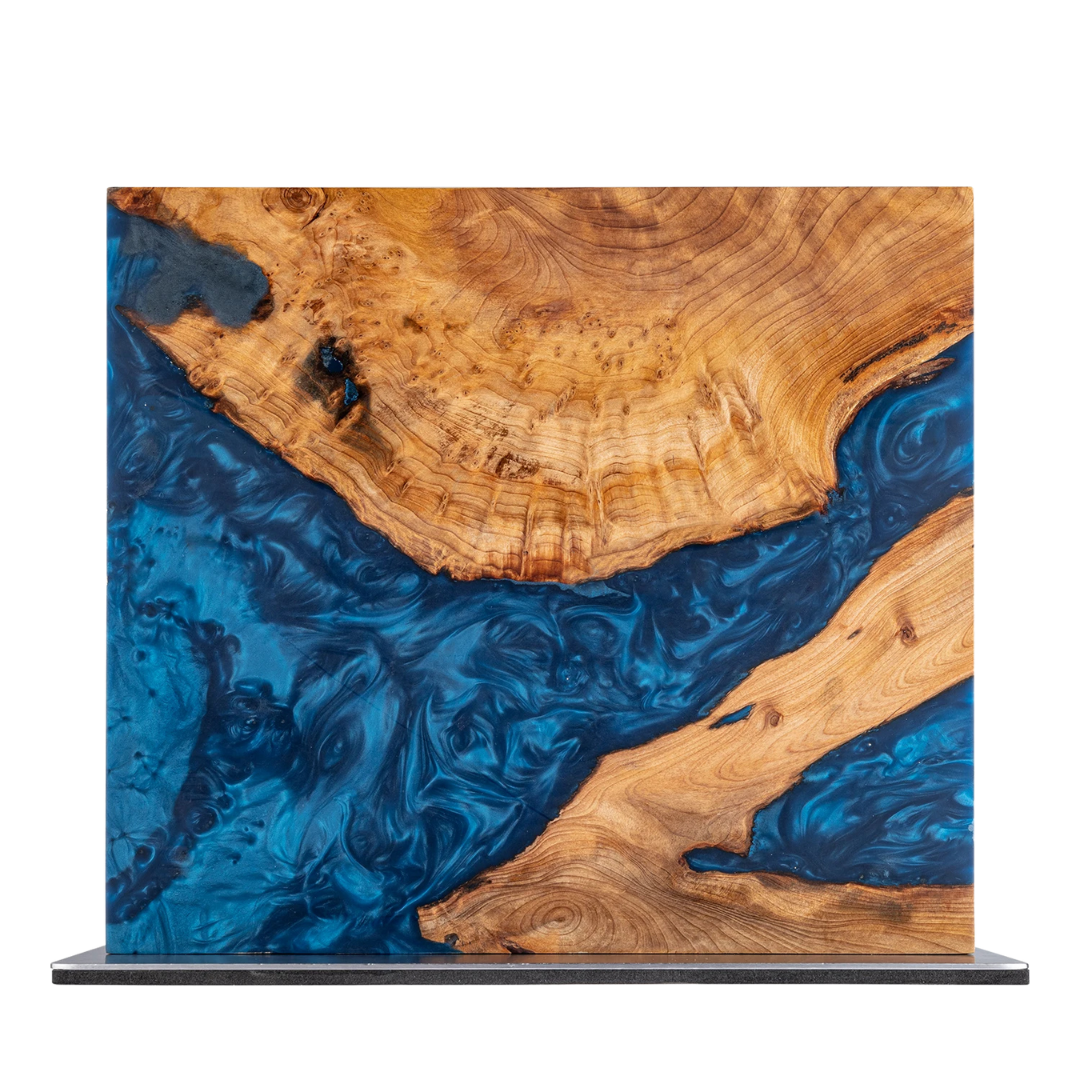 Wood and blue resin art piece with swirling patterns.