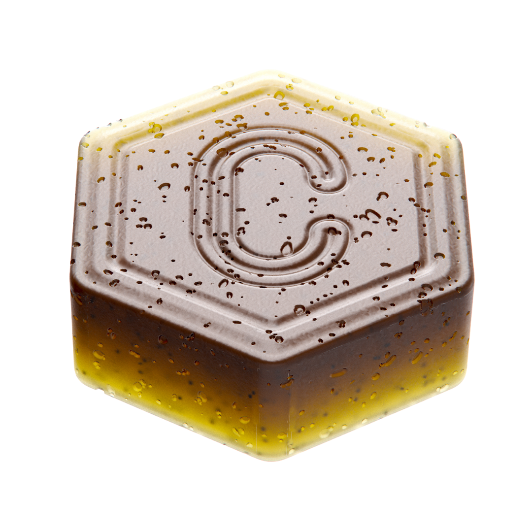 Hexagonal gummy with a letter 'C' and a gradient from brown to yellow.