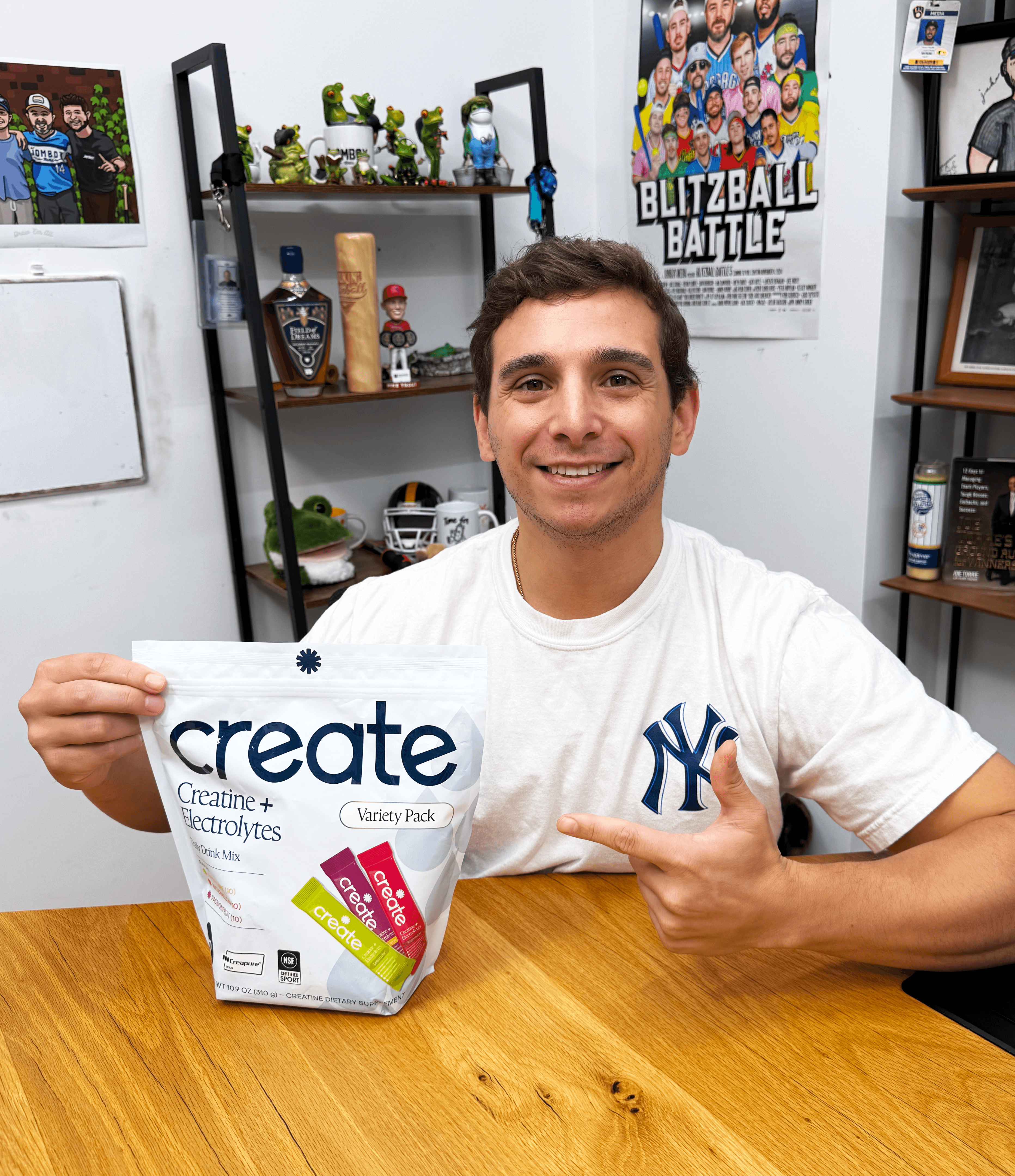 Several colorful packets of Create Creatine Gummies sticking out of an open black gym bag.