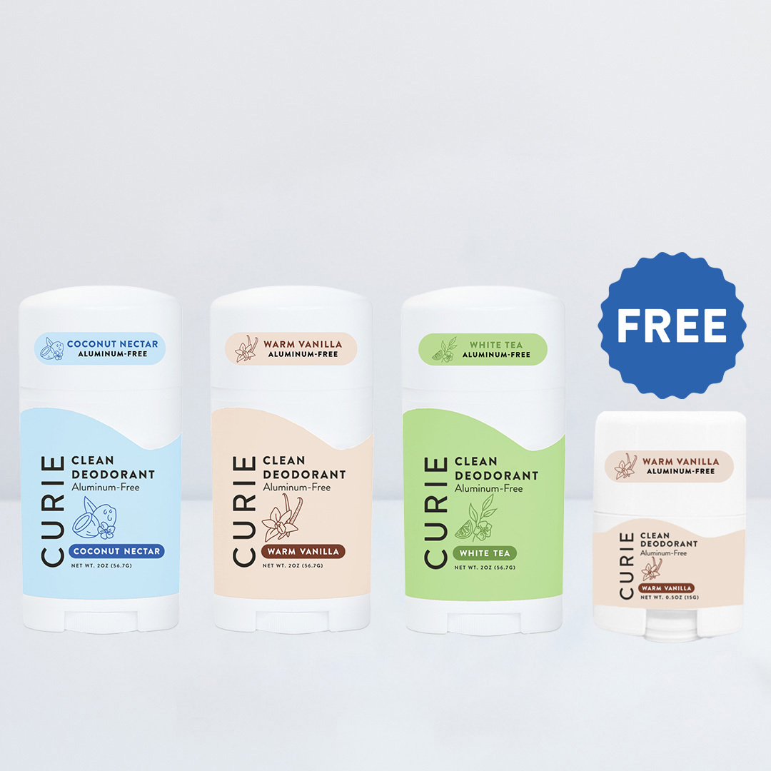Three full-size and one mini Curie brand deodorants in different scents, with a 'FREE' sticker.