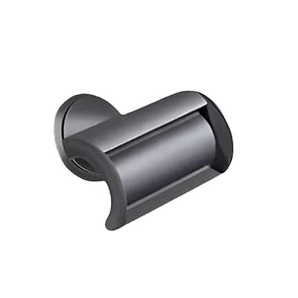 Chrome wall-mounted toothbrush holder on a gray background.