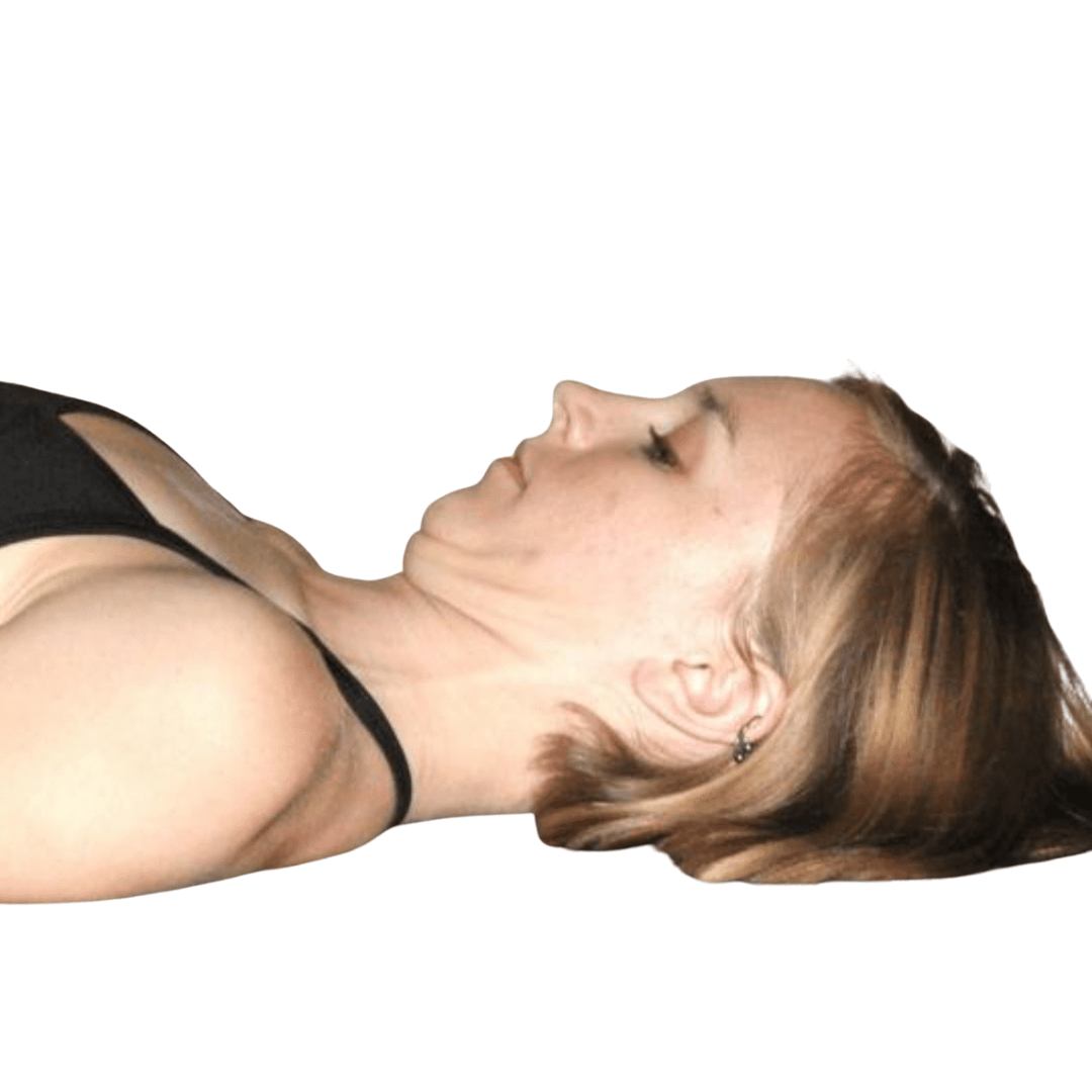 Person lying on their back, practicing chin tuck exercise.