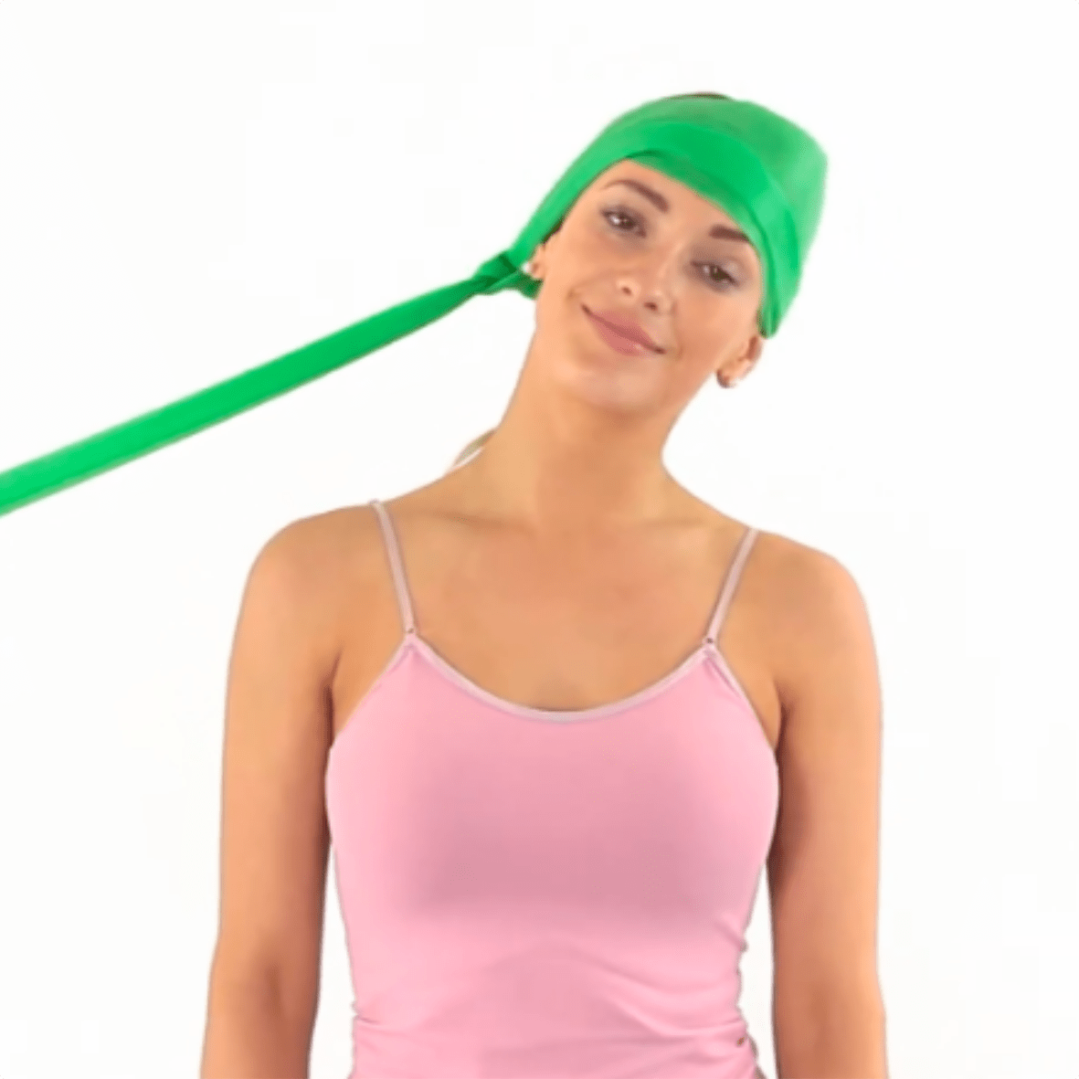 Person demonstrating head exercise using a green resistance band.