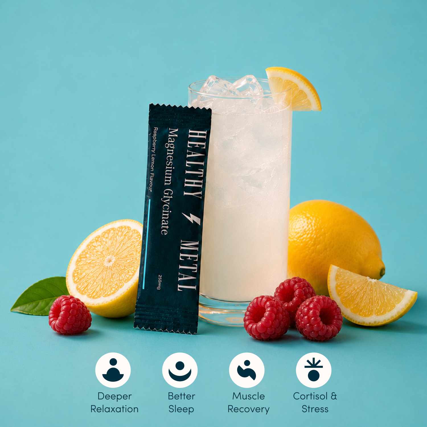 A sachet of Healthy Metal magnesium powder next to an iced drink with lemons and raspberries.