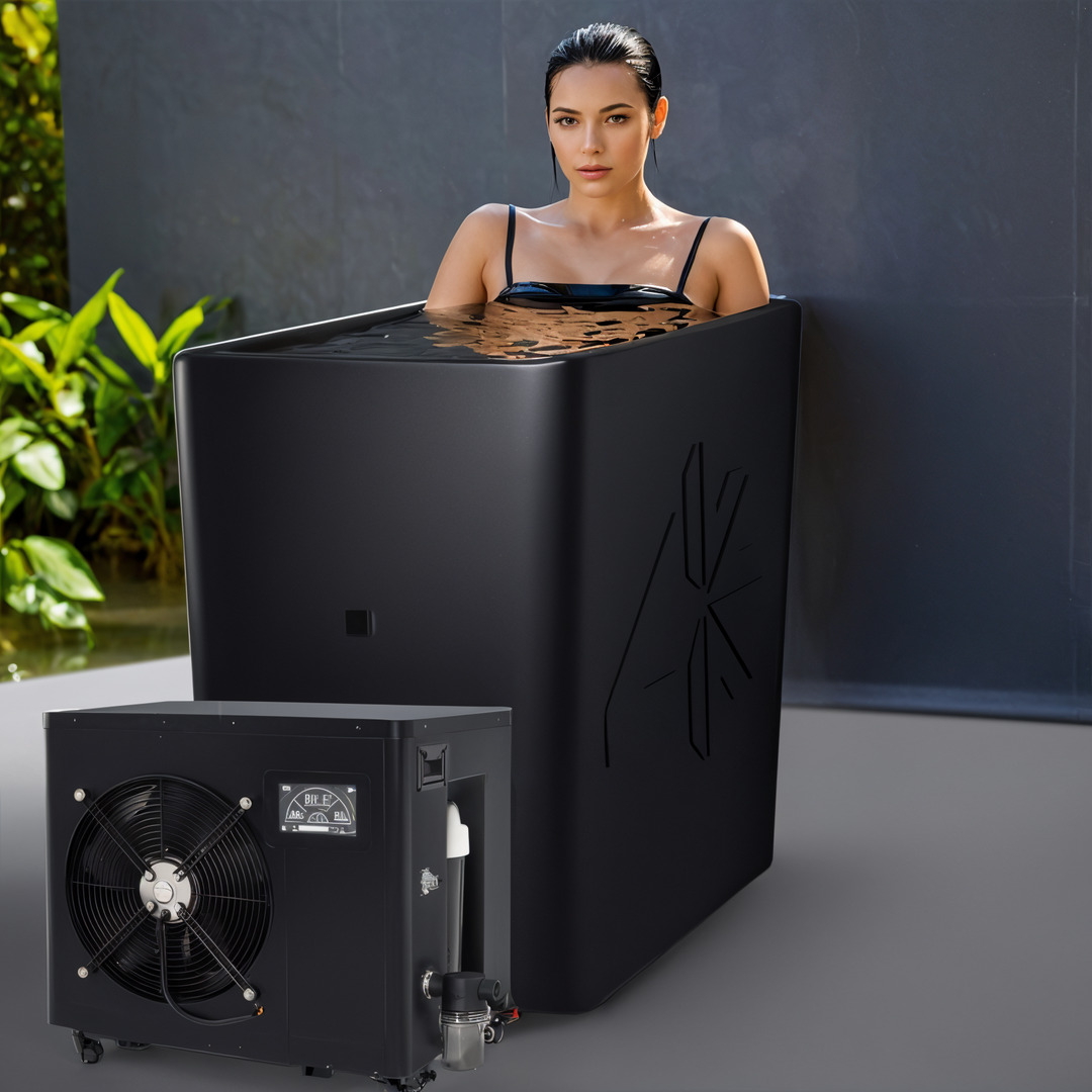 Person in a black tub with a cooling unit beside it.