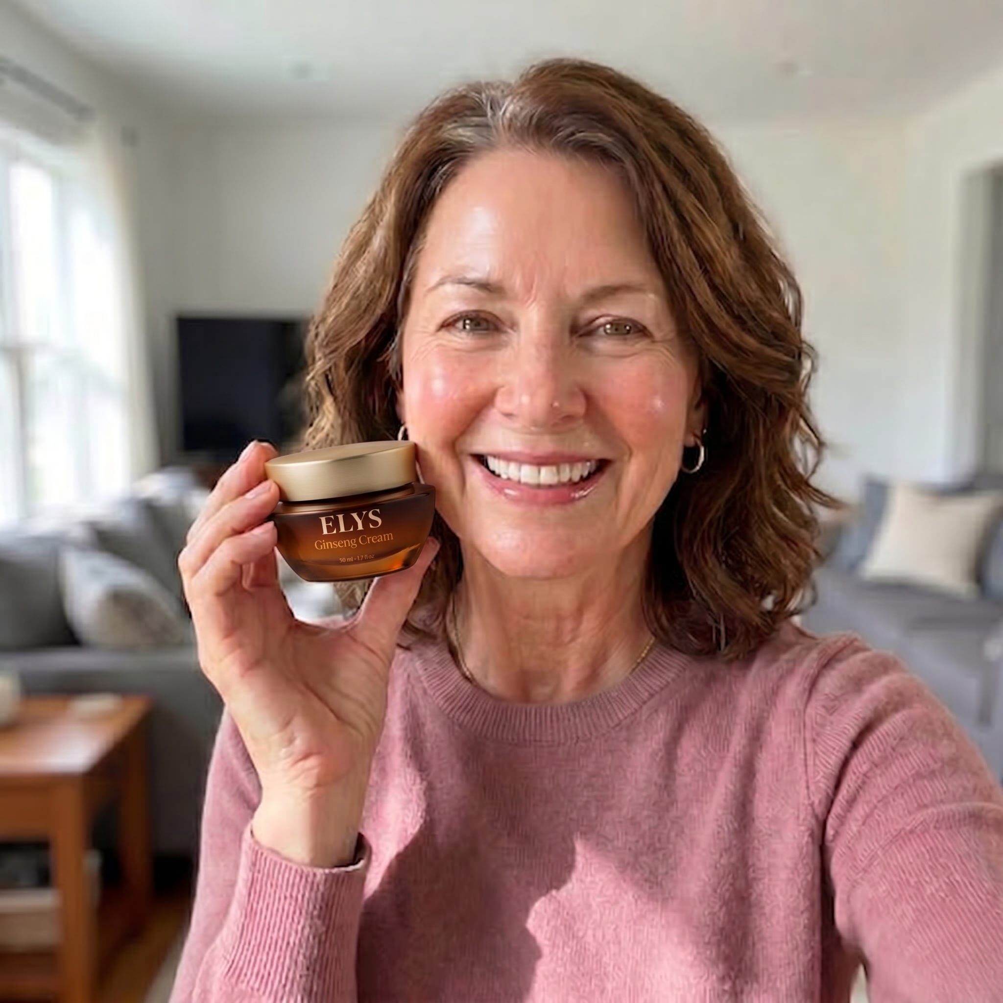 A smiling woman in a pink sweater holds a small brown jar of ELYS Ginseng Cream.
