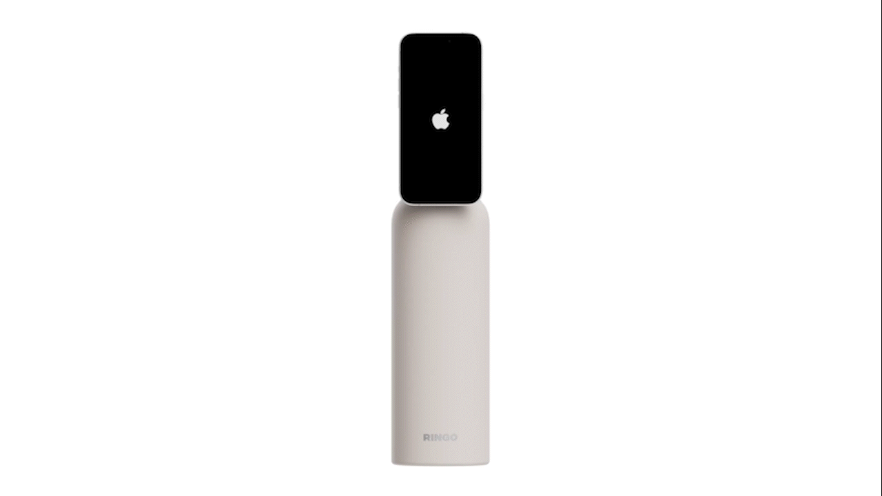 Smartphone attached to a water bottle with a grip holder.