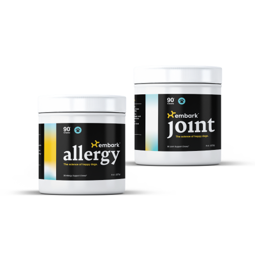 Two white jars of Embark brand dog supplements, one for allergy and one for joint support.