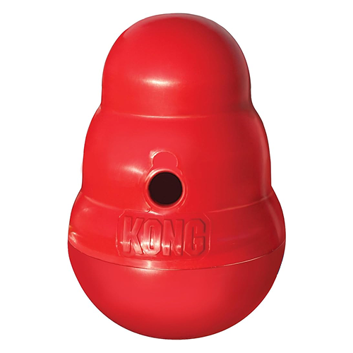 A red, pear-shaped KONG dog toy with a hole for treats, on a white background.