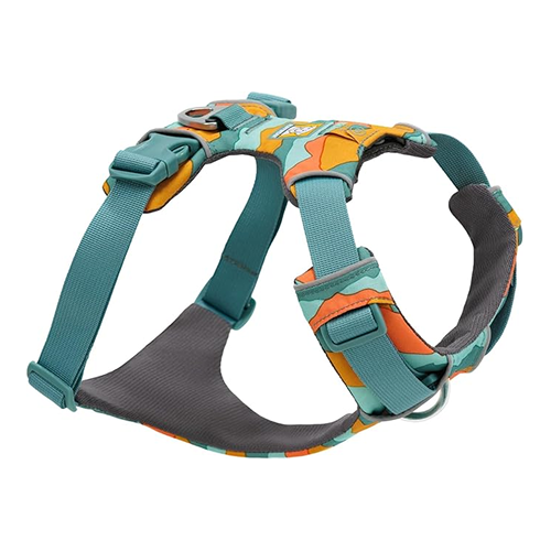 A colorful dog harness with teal straps and an orange, yellow, and green pattern against a white background.