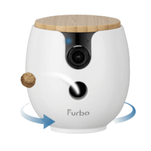A white Furbo pet camera with a wooden top tossing a treat while rotating on a white background.
