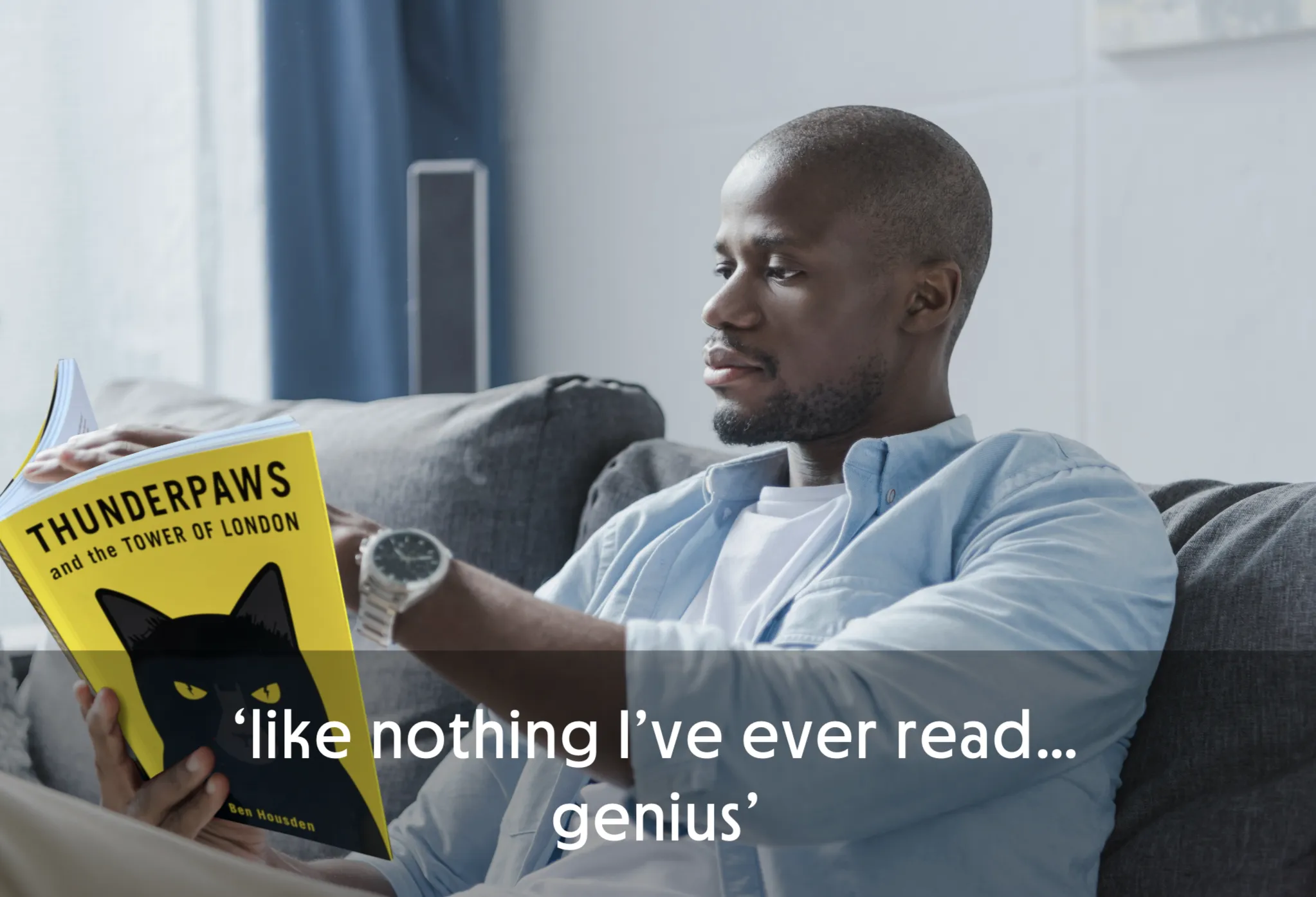 Person reading a book titled 'Thunderpaws and the Tower of London' on a couch.
