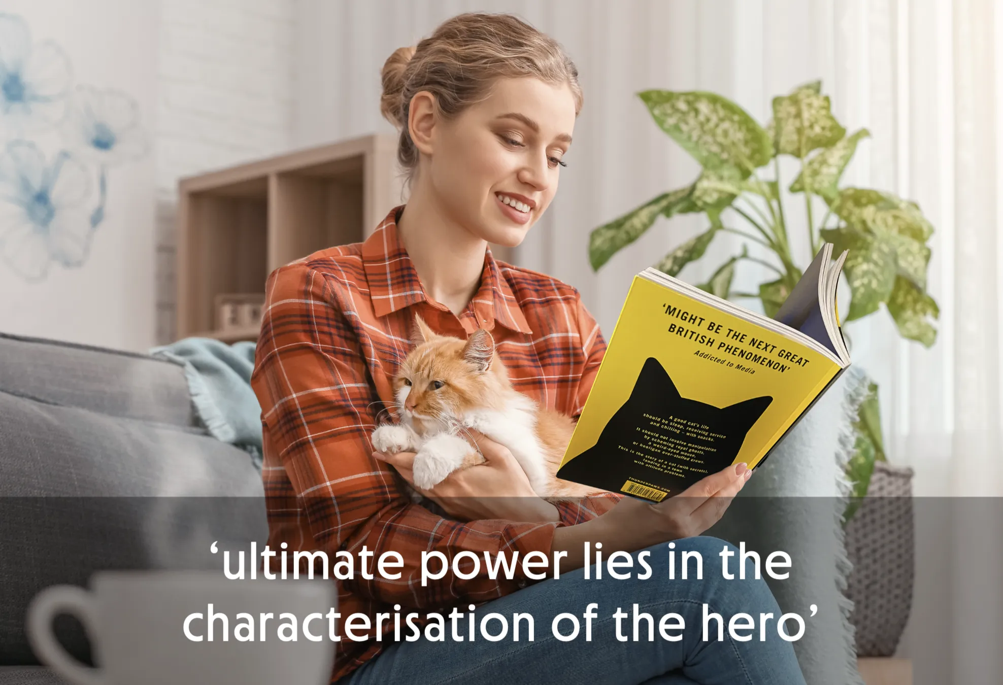 Woman reading a book while holding a cat on a couch.