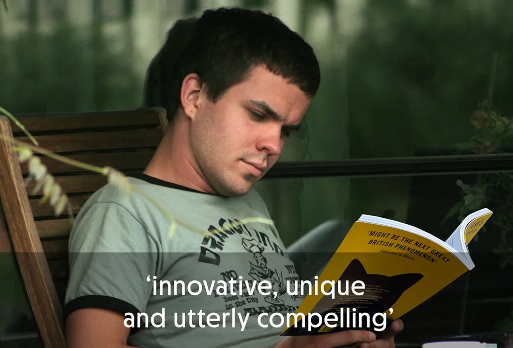 Man reading Thunderpaws outside, with the quote “innovative, unique and utterly compelling.”