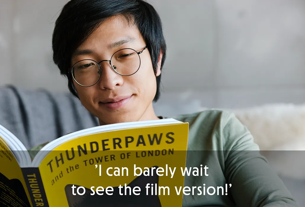 A smiling man reading 'Thunderpaws and the Tower of London’ with the quote “I can barely wait to see the film version!”