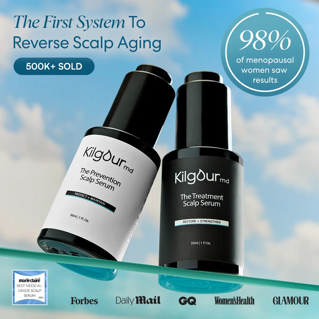 Two Kilgdur md scalp serum bottles, for prevention and treatment, resting on a glass shelf against a sky background.