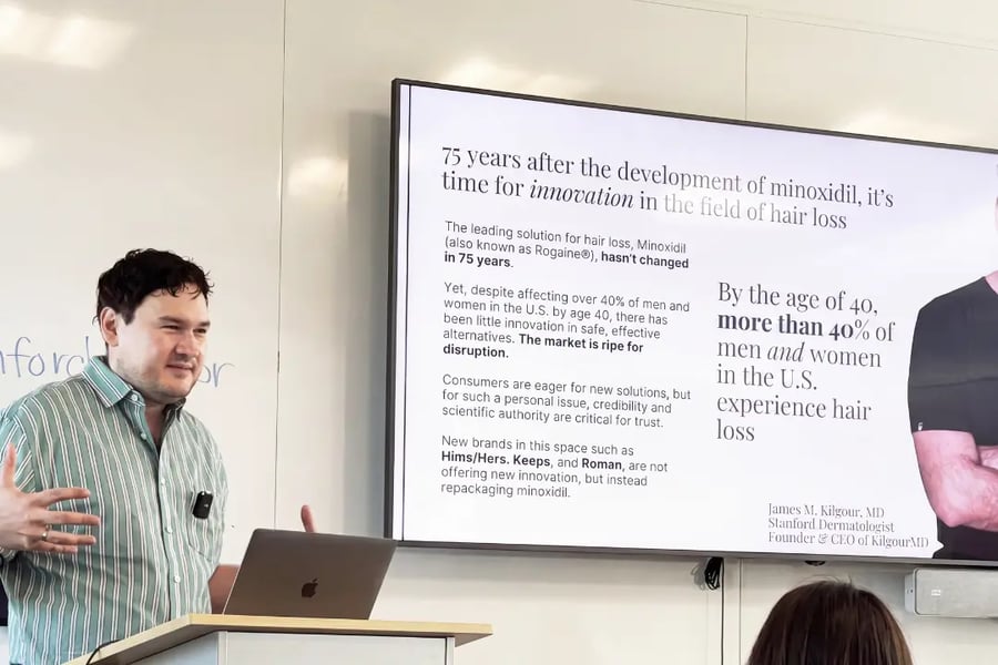 Dr. James Kilgour presenting the hair-loss research