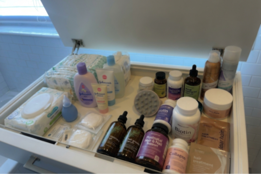 Postpartum hair products in a drawer