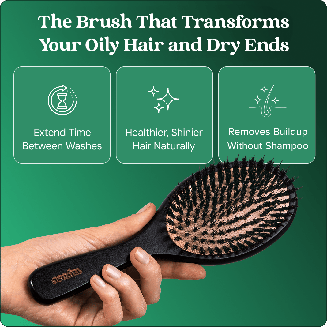 Hand holding a black hairbrush with text about hair benefits on a green background.