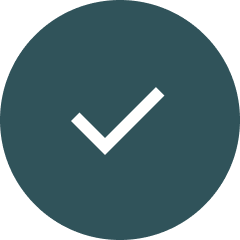 White checkmark inside a dark green circle.