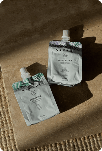 Two pouches labeled 'Slim Mood' and 'Night Relax' on a textured surface.