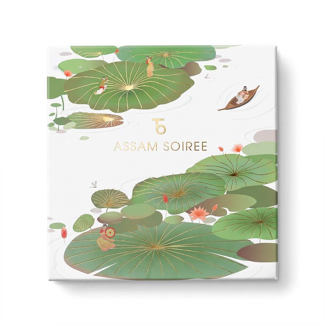 A white 'Assam Soiree' box with an illustrated scene of a lotus pond with tiny figures.