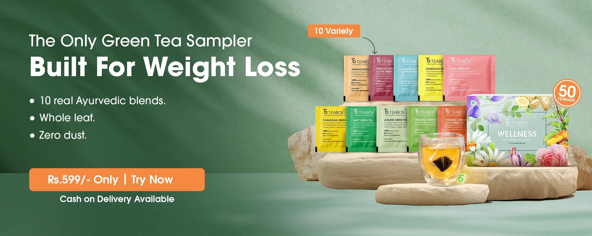 A promotional banner for a Teabox green tea sampler, featuring various tea bags and a glass of tea.