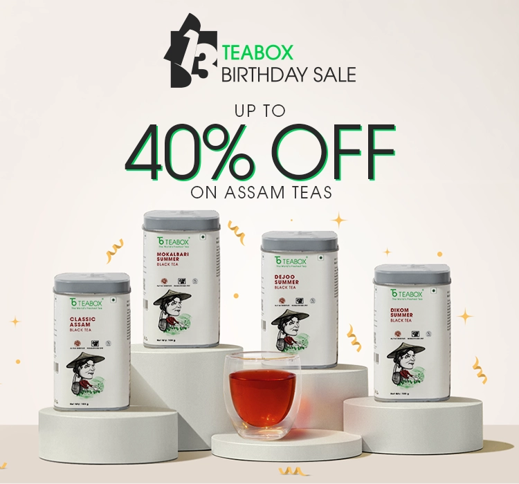 Teabox Birthday Sale ad with 40% off Assam teas, featuring four tea tins and a glass of tea.