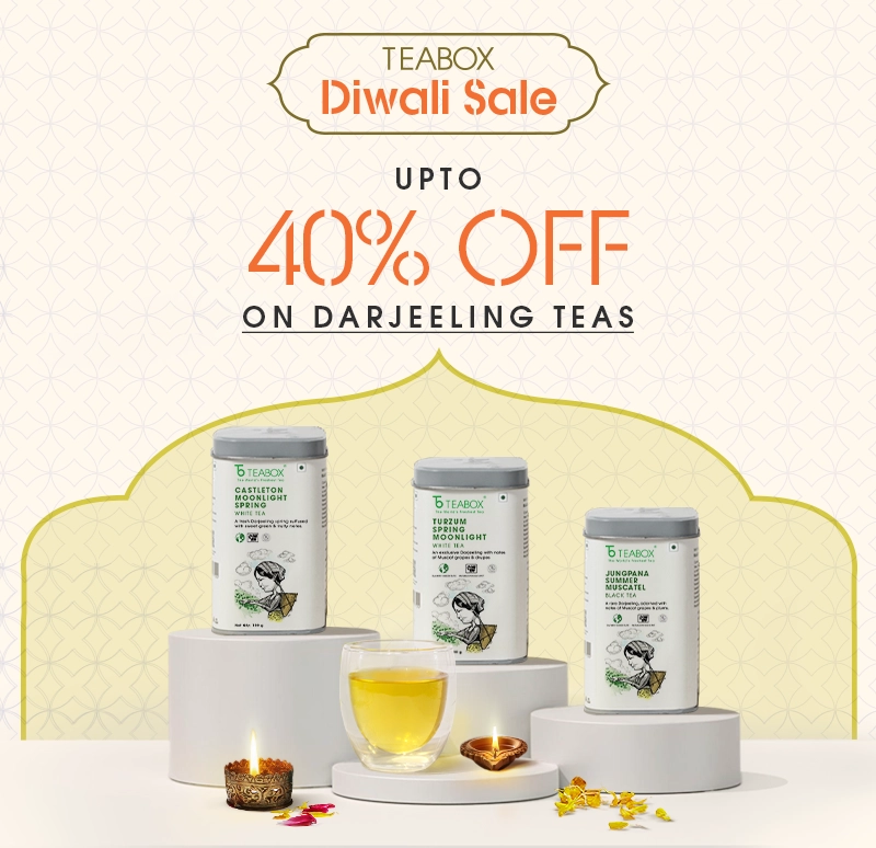 Teabox Diwali sale banner with three tea containers and a glass cup.