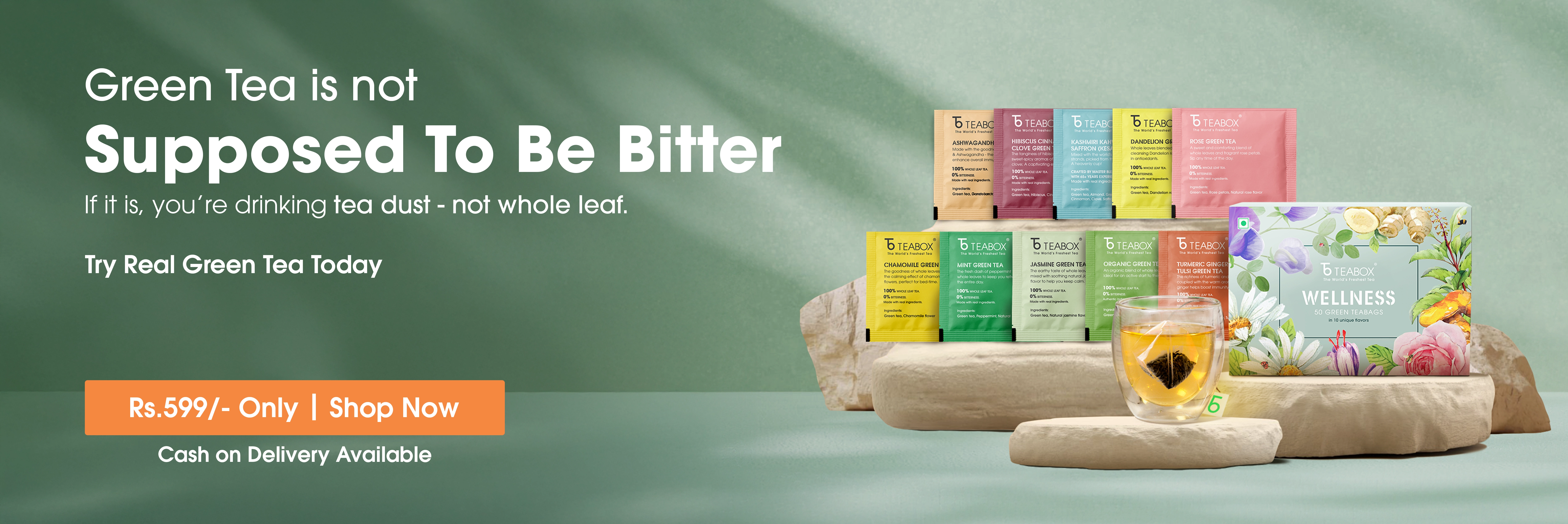 An advertisement for Teabox green tea, showing various colorful tea packets and a glass of brewed tea.